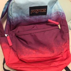 Jansport backpack. Teal, purple, pink.